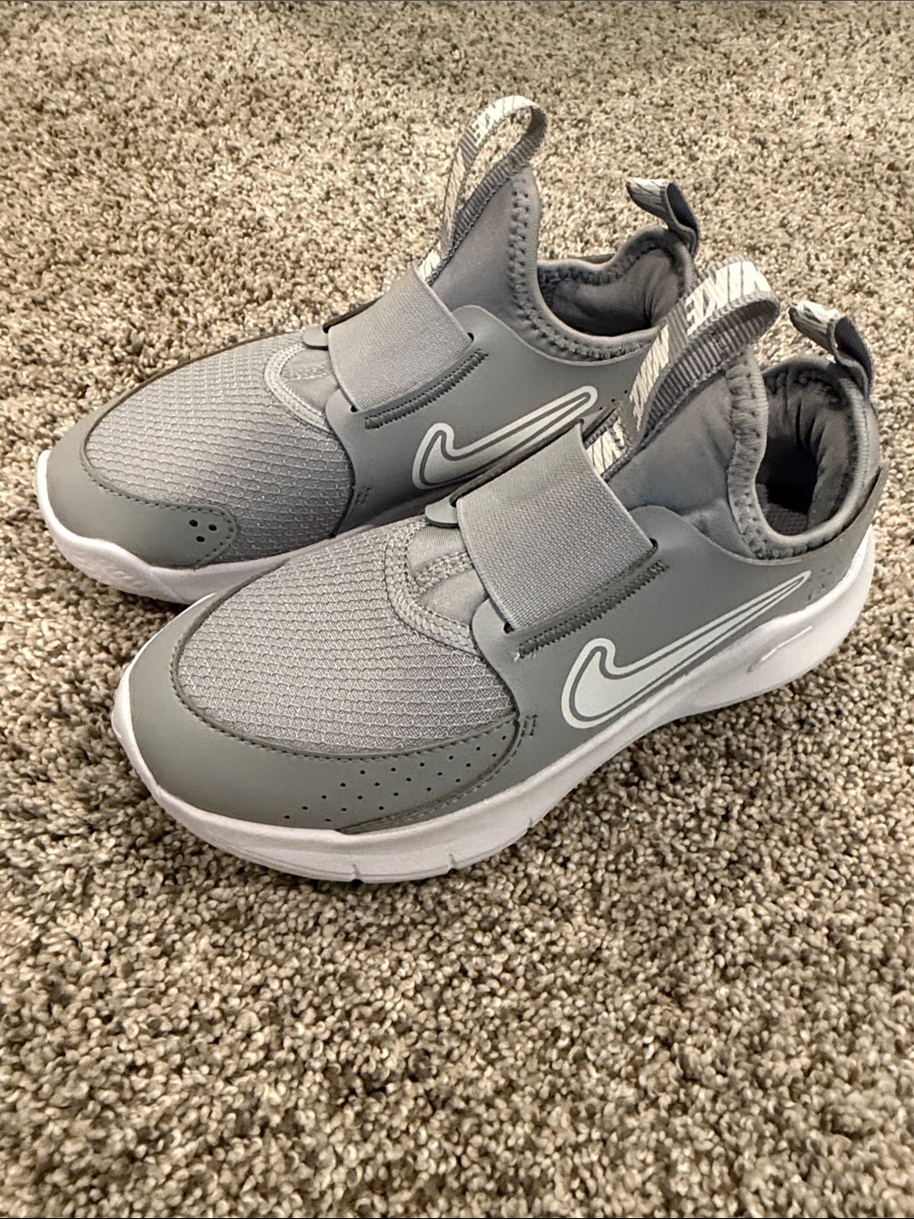 Nike Kids Grey Slip-On Sneakers with White Swoosh